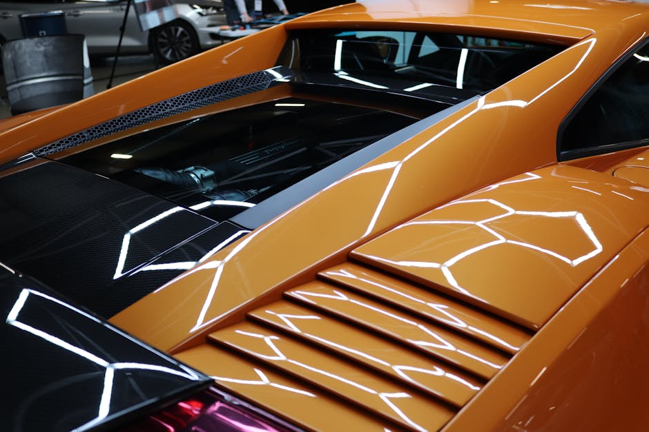 Luxury car detailing and polishing showing pristine paint protection